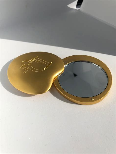 dior hand held mirror|real gold compact mirror.